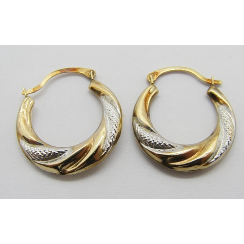 383 - Group of yellow metal hoop earrings of various design, some stamped 375, 4.8g total