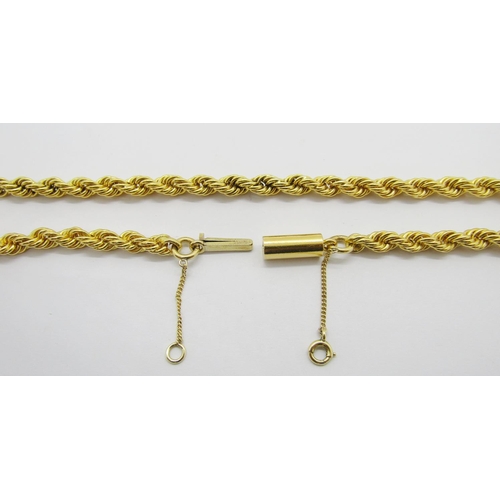 387 - Good quality yellow metal rope twist chain necklace with barrel clasp, indistinctly stamped, possibl... 