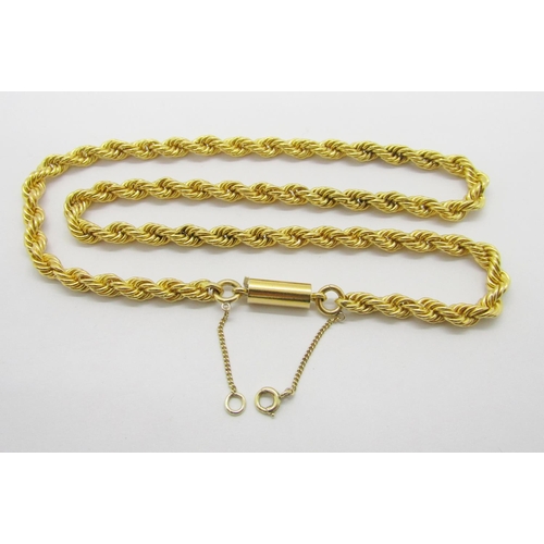 387 - Good quality yellow metal rope twist chain necklace with barrel clasp, indistinctly stamped, possibl... 