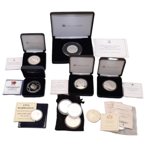 957 - Cased commemorative silver proof coins to include a ‘Royal British Legion Silver Poppy Coin’, ‘Queen... 