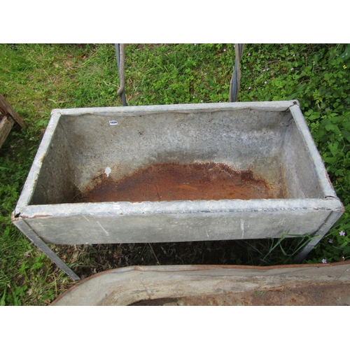 1028 - A vintage galvanised steel dairy trough, a galvanised baht, small garden incinerator, etc (AF)