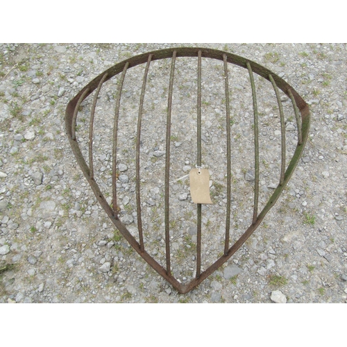 1091 - An old iron work bow fronted corner stable hay manger 82 cm high x 86 cm wide