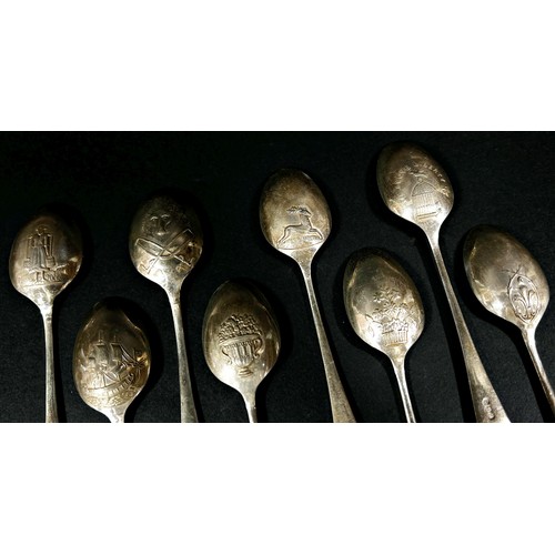 259 - A cased set of eight silver “Emblematic Teaspoons of the 18th Century”, each spoon a reproduction of... 