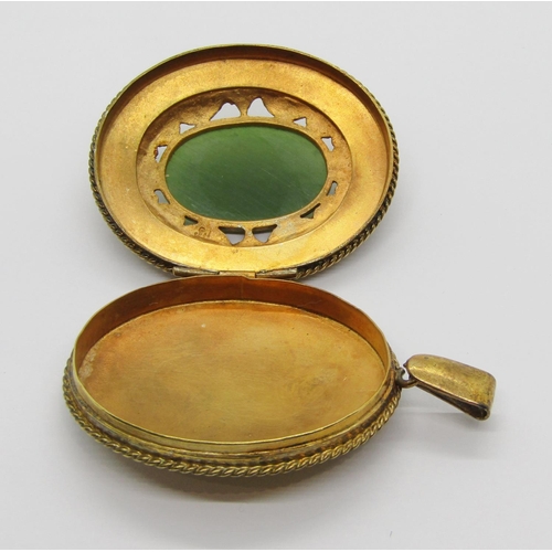 400 - Large silver gilt locket set with nephrite and marcasite, stamped 'KCLSTERSIL' to reverse, 6.5cm L a... 