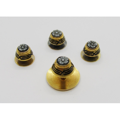 403 - Set of four yellow metal dress studs set with sardonyx forget-me-nots with black enamel detail, 4g t... 