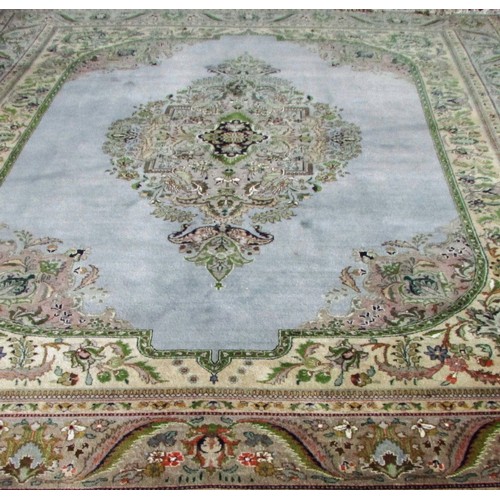 1787A - A good quality Tabriz carpet, purchased in Shiraz, Iran with a large central floral medallion on a p... 