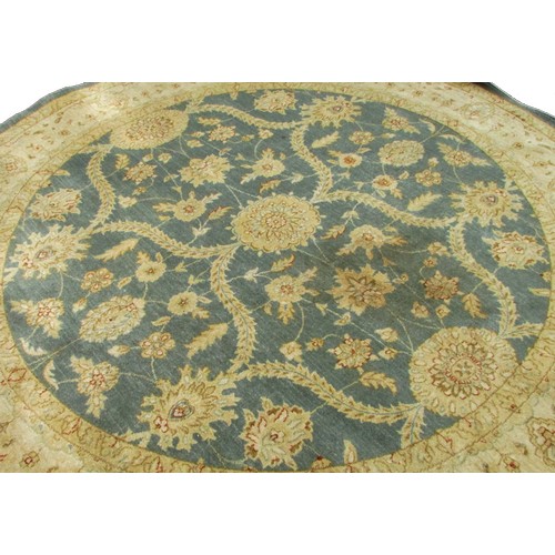 1795 - A circular Ziegler style carpet with trailing flowers on sage blue ground, 245cm diameter