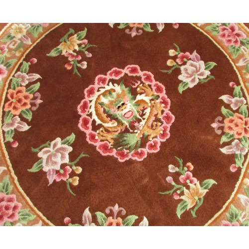 1798 - Two small Chinese rugs - one round brown with dragon central medallion 130cm diameter  and one recta... 