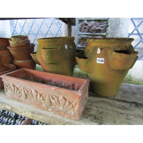 1126 - Two small weathered terracotta strawberry planters 28 cm high, a collection of small terracotta flow... 