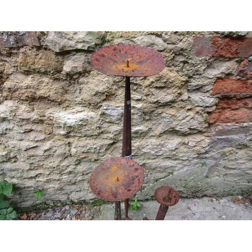 1172 - Three old weathered iron pricket candlestands (same design but varying height) with faceted and bobb... 