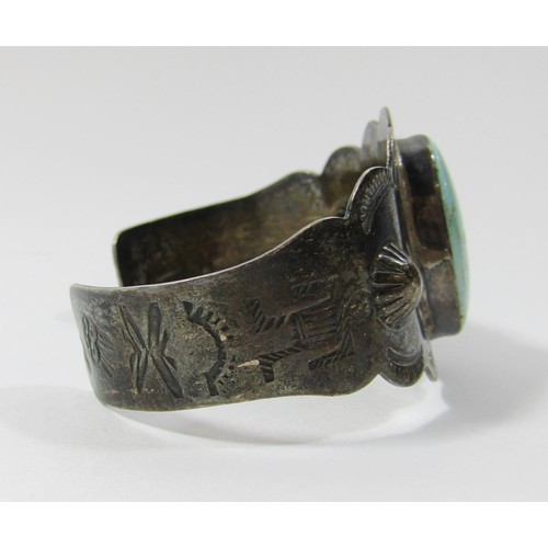 427 - Group of silver and white metal jewellery comprising a Navajo Native American cuff bracelet set with... 