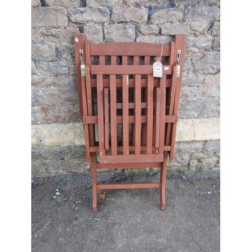 1173A - A contemporary stained hardwood folding steamer type chair with slatted seat, back and foot rest