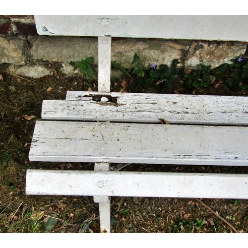 1166 - A vintage garden or park bench with painted timber slats raised on sprung steel supports, 244 cm (8f... 