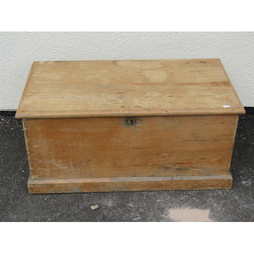 1683 - A stripped pine chest with hinged lid 39 cm high x 85 cm long x 47 cm