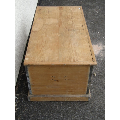 1683 - A stripped pine chest with hinged lid 39 cm high x 85 cm long x 47 cm