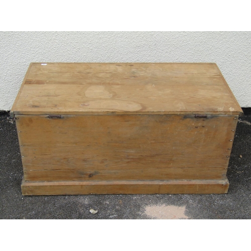 1683 - A stripped pine chest with hinged lid 39 cm high x 85 cm long x 47 cm