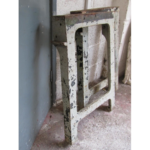 1691 - A pair of painted vintage heavy cast iron industrial machine / bench supports, 88cm high, 58cm wide.