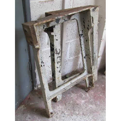 1691 - A pair of painted vintage heavy cast iron industrial machine / bench supports, 88cm high, 58cm wide.