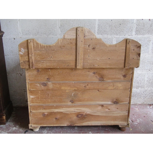 1700 - A small Victorian stripped pine dresser partially enclosed by a fielded panelled door and 3 long dra... 