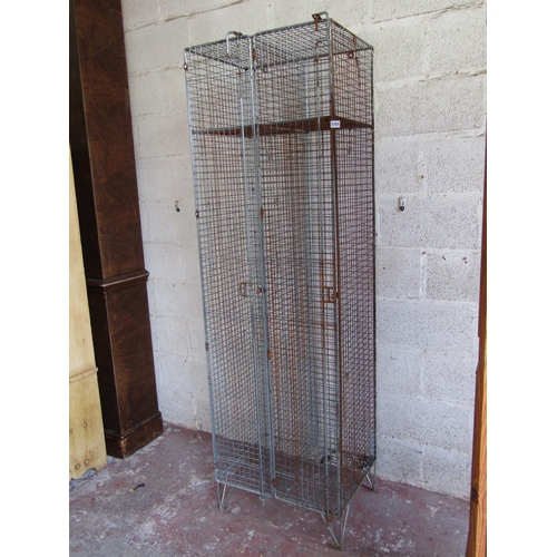 1701 - An industrial steel wirework locker with two compartments, 200cm high x 61cm wide x 48cm deep