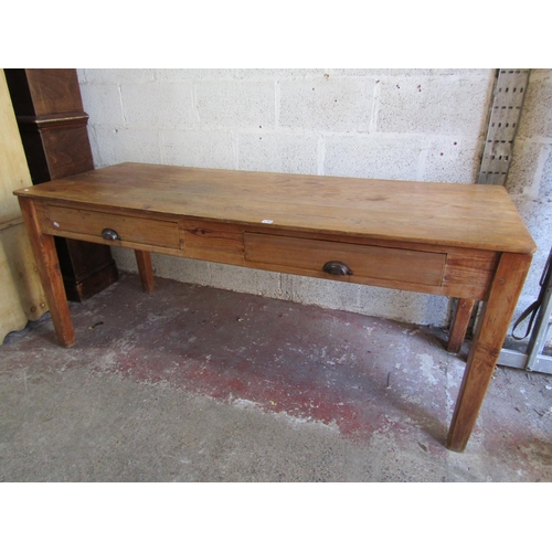 1702 - An old stripped pine kitchen dining table with two frieze drawers on square tapered supports, 76cm h... 