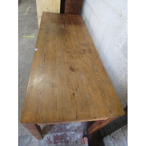 1702 - An old stripped pine kitchen dining table with two frieze drawers on square tapered supports, 76cm h... 