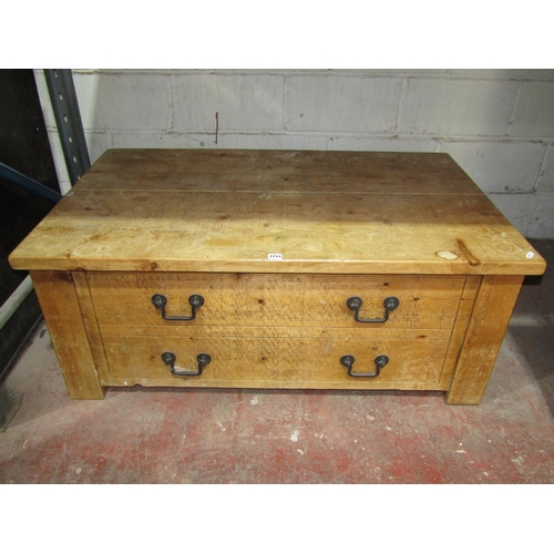 1711 - A substantial rustic pale pine low occasional /centre table, fitted with two real and two dummy draw... 