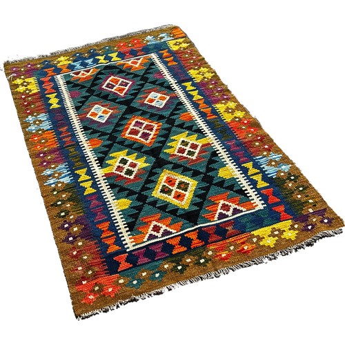 1791 - A Maimana Kilim with a panel of multicoloured medallions 162 x 95cm