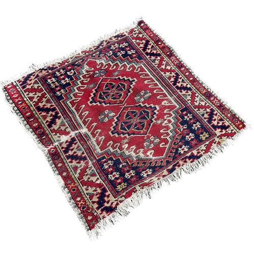 1788A - Three small old Persian mats all approximately 40 x 50 cm