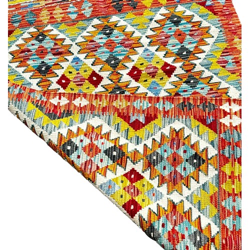 1778 - A Chobi Kilim  with three rows of interlocking stepped diamonds 147 x 104cm