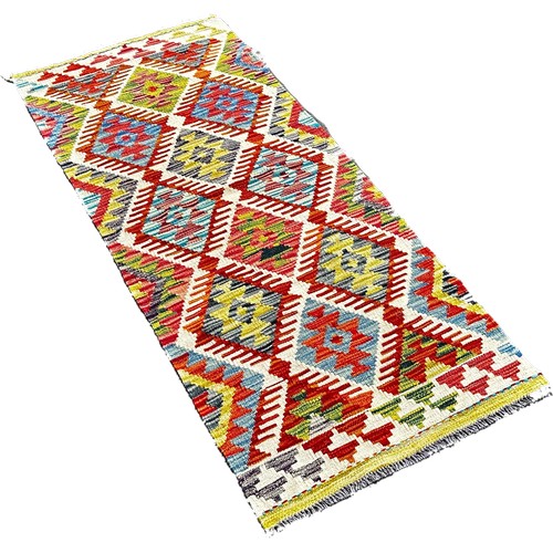 1775 - A Chobi Kilim runner with three rows of stepped diamond medallions 156 x 61cm