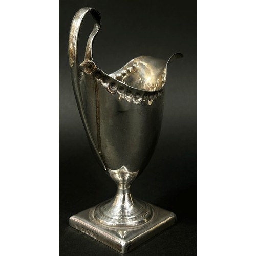 263 - A George III silver cream jug, London 1792, makers mark rubbed, 2.7oz