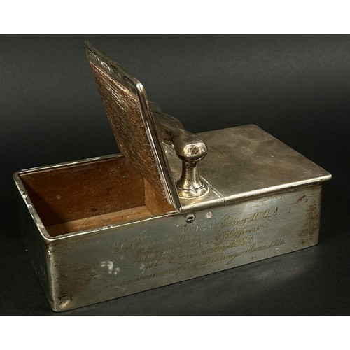 265 - A silver double ended cigarette box with a central handle, together with a Grenadiers bomb table lig... 