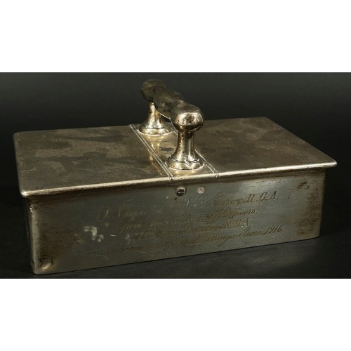 265 - A silver double ended cigarette box with a central handle, together with a Grenadiers bomb table lig... 