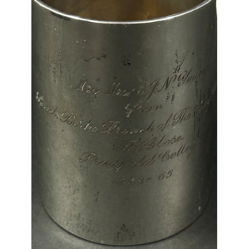 266 - A silver tankard, two silver napkin rings, a small dish and an egg cup (weighted) 10.7oz all in