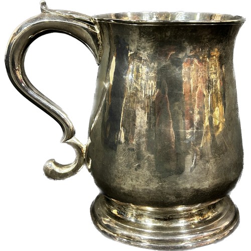 A Channel Islands silver 2 pint baluster tankard with an acanthus scrolled handle, stamped I H of Guernsey (Jean Henry 1727-1783) with a French inscription to the underside of base dated 1771, 15.5cm tall and 10.5cm diameter, 19.3oz (600 grams) together with a pamphlet on Channel Islands silver