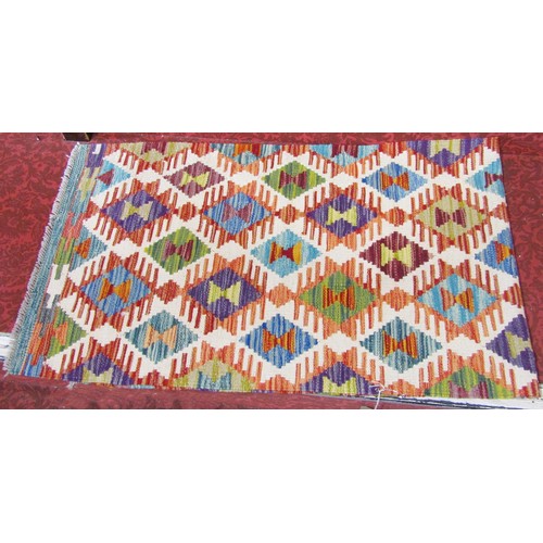 1770 - A Chobi Kilim runner with an all over stepped medallion design 200 x 62cm