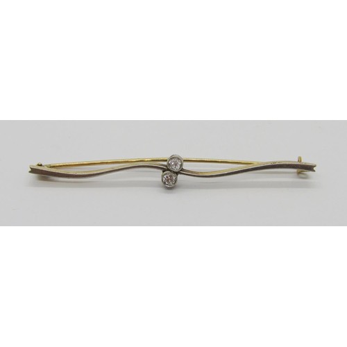 266 - Antique diamond crossover bar brooch of wavy form, set with two diamonds 0.10ct each approx, in bi-c... 