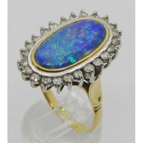 288 - Good quality 18ct oval opal and diamond cluster ring, opal 18 x 10mm approx, size R, 9.2g (see photo... 