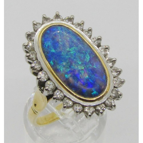 288 - Good quality 18ct oval opal and diamond cluster ring, opal 18 x 10mm approx, size R, 9.2g (see photo... 