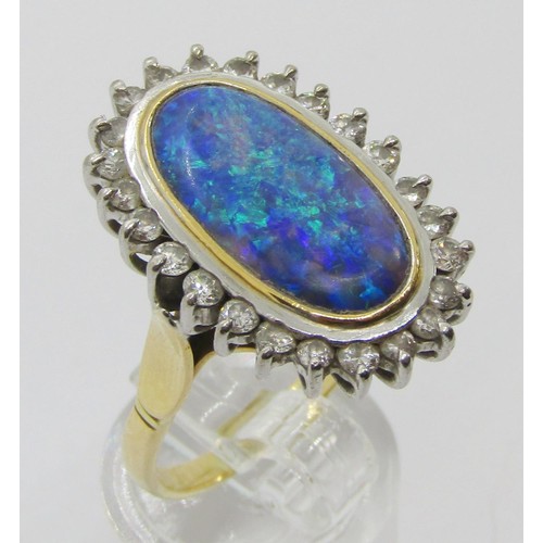 288 - Good quality 18ct oval opal and diamond cluster ring, opal 18 x 10mm approx, size R, 9.2g (see photo... 