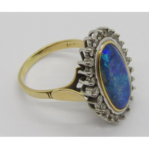 288 - Good quality 18ct oval opal and diamond cluster ring, opal 18 x 10mm approx, size R, 9.2g (see photo... 