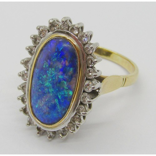 288 - Good quality 18ct oval opal and diamond cluster ring, opal 18 x 10mm approx, size R, 9.2g (see photo... 