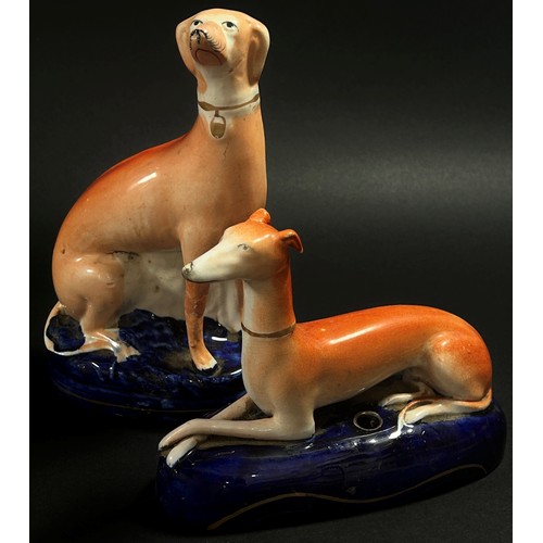 31 - Four Staffordshire greyhound models, the largest 24 cm high (4)