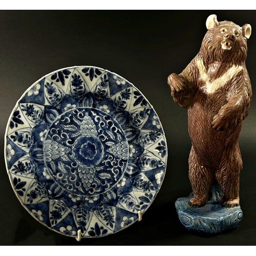 44 - A Chinese export porcelain model of a standing bear with glazed finish, 28 cm high, together with a ... 