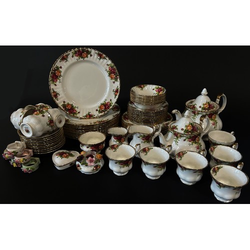 21 - A quantity Royal Albert Old Country Roses pattern tea, coffee and dinner wares comprising eleven din... 