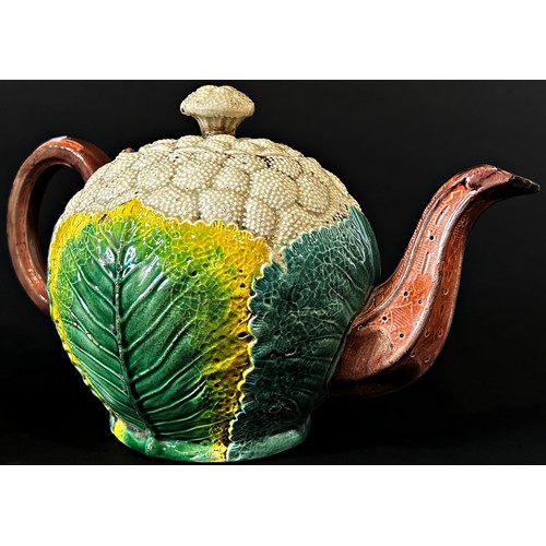 66 - A scarce 19th century Copeland Majolica teapot moulded as a cauliflower with polychrome glazed finis... 