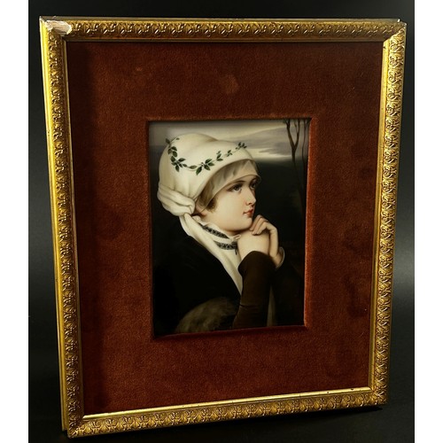 69 - A 19th century painted porcelain panel decorated with a half length portrait of a maiden in contempl... 