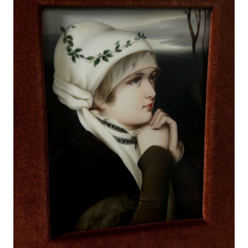 69 - A 19th century painted porcelain panel decorated with a half length portrait of a maiden in contempl... 