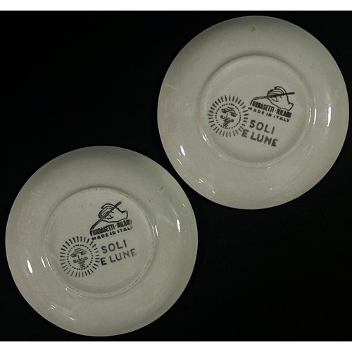 70 - A pair of Italian Fornasetti dishes in the Soli E Lune range, each 8 cm diameter (2)